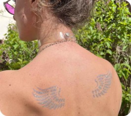 Tatouage paillettes ailes d'ange Si Si La Paillette